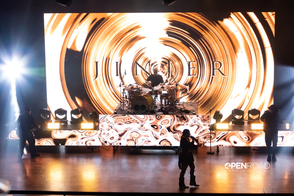 Wide photo of the band Jinjer on stage during their Duel tour
