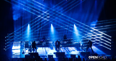 Interpol St. Louis concert bathed in blue hues. Photo taken from above.