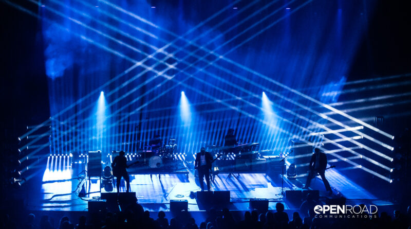 Interpol St. Louis concert bathed in blue hues. Photo taken from above.
