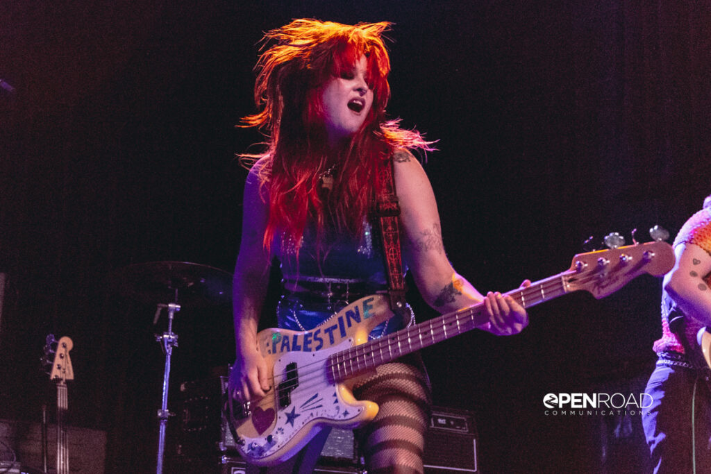 Big Girl's Kaitlin Pelkey playing guitar